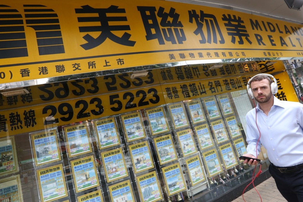 Hong Kong housing prices fell in November by the most for any single month since 2008. A file photo of a Midland Realty branch on Wong Nai Chung Road, Causeway Bay, on September 1. Photo: Nora Tam