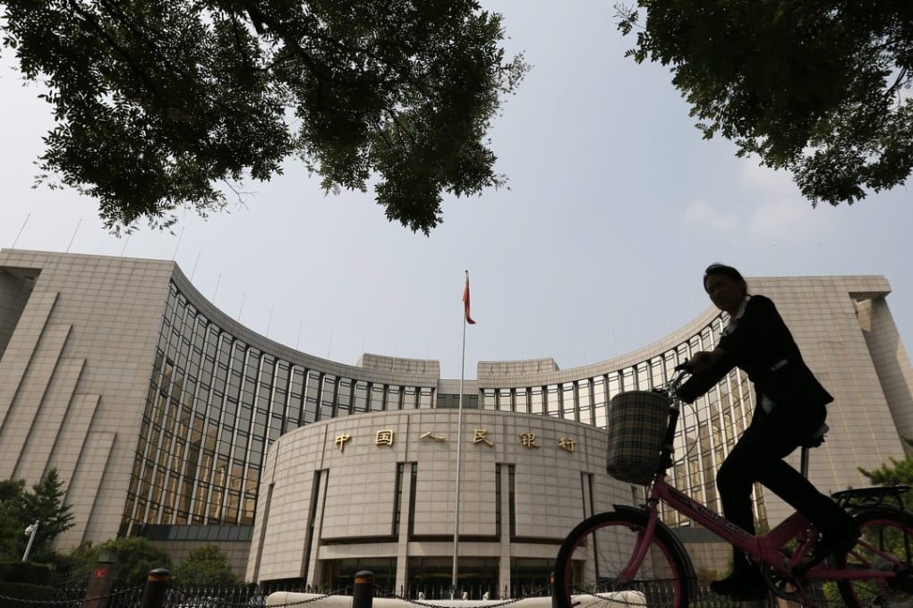 The People’s Bank of China is trying to move to a new policy benchmark interest rate replacing the old lending cap. Photo: EPA