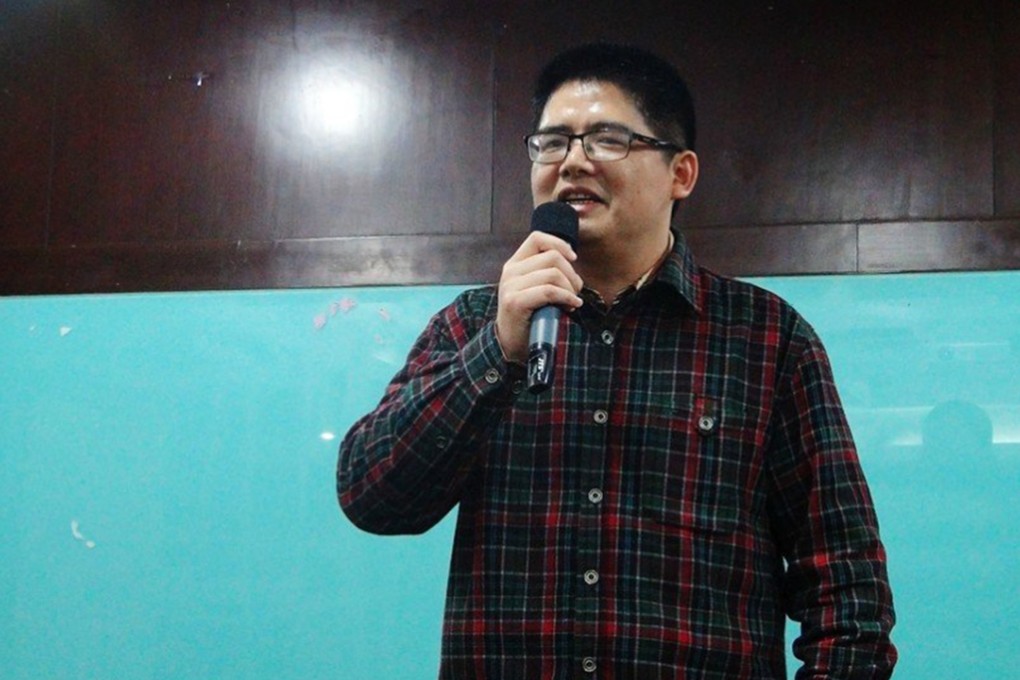 Zeng Feiyang, director of the Panyu Migrant Workers Centre in the southern city of Guangzhou, has been charged with “disturbing social order, his lawyer says. Photo: SCMP Pictures