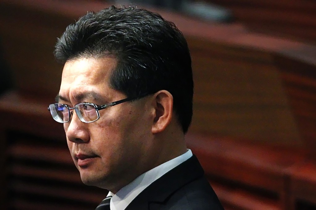 Greg So Kam-leung, Secretary for Commerce and Economic Development, said the current situation, with discussion of other issues being delayed over the copyright bill dispute, is like “seven million Hongkongers are being chained to a chariot”. Photo: Felix Wong
