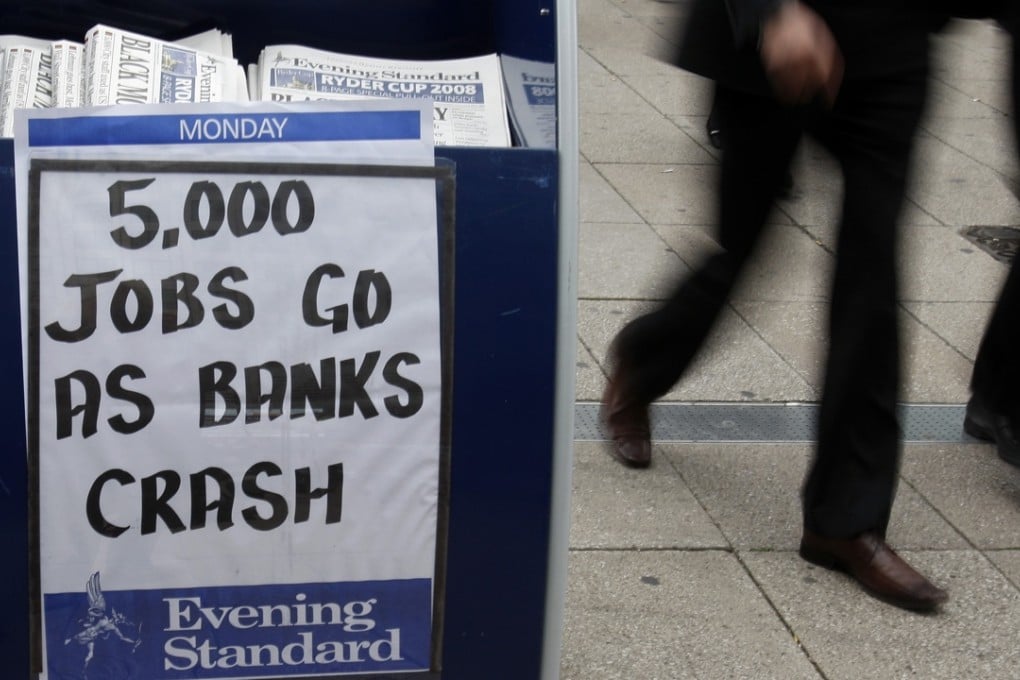 Newspapers are sold near the offices of Lehman Brothers in London’s Canary Wharf on September 15, 2008. Photo: AP