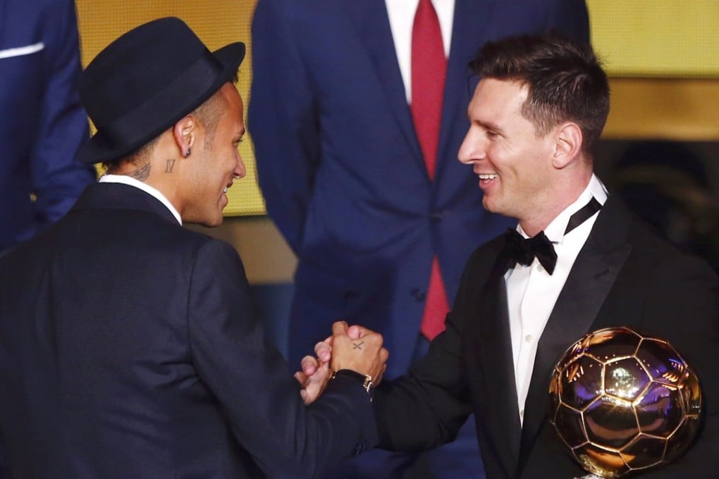 Barcelona forward Lionel Messi of Argentina is congratulated by Barca teammate Neymar after claiming the Fifa World Player of the Year award. Photo: Reuters