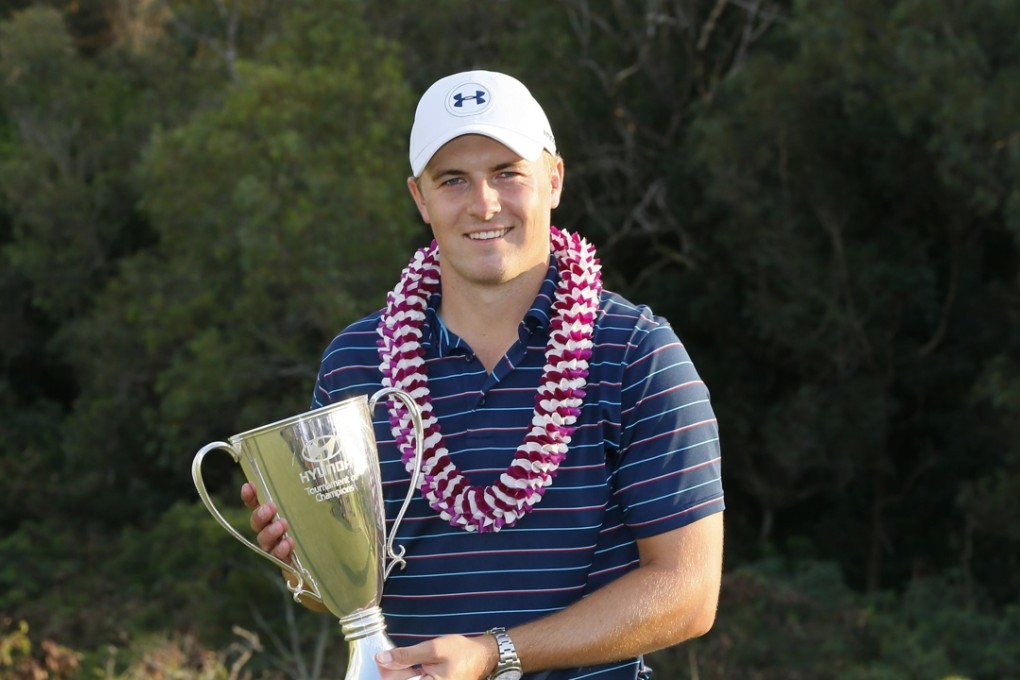 Jordan Spieth with the trophy after his latest win, in the Tournament of Champions on Sunday. Photo: AP
