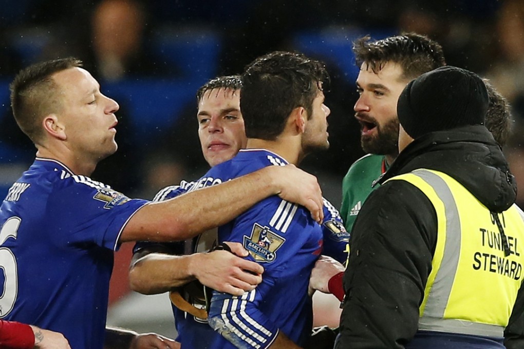 Chelsea's Diego Costa clashes with West Brom's Boaz Myhill at the end of the 2-2 draw at Stamford Bridge. Manager Guus Hiddink says he is pleased to have Costa. Photo: Reuters