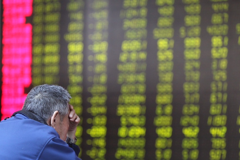 An investor at a brokerage house in Beijing on Thursday morning.Photo: Simon Song