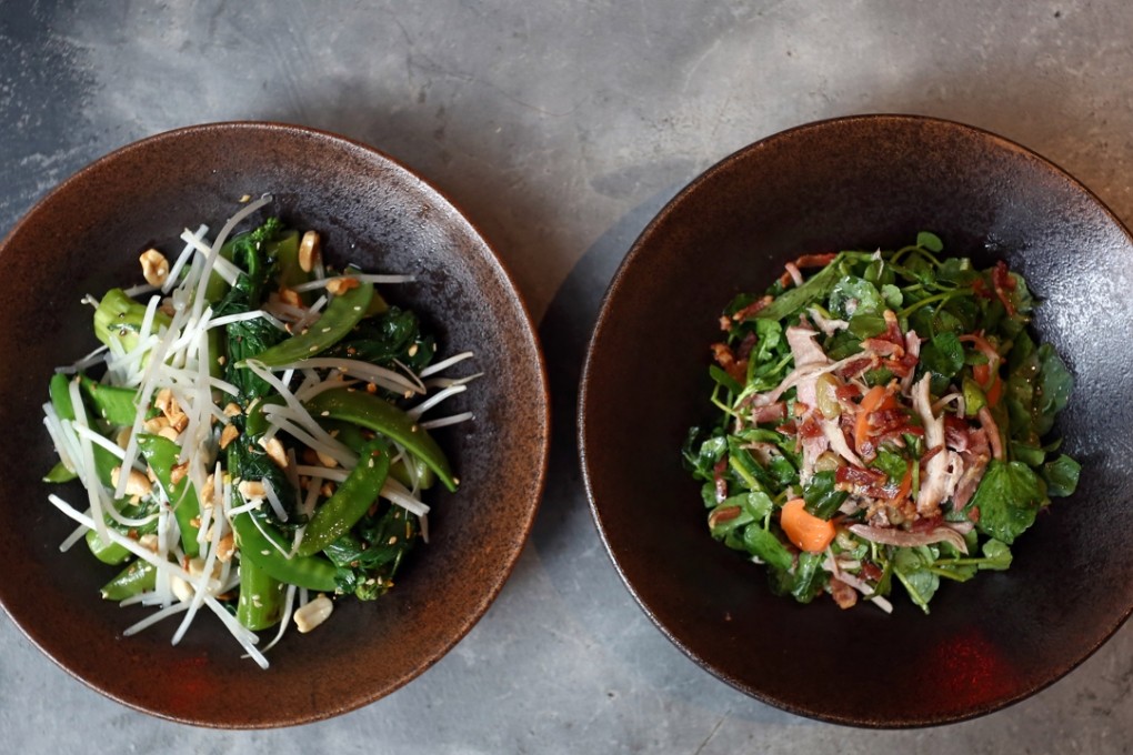 Choi sum salad with bean sprouts and peanuts (L) and pickled carrots and ham hock salad from The Fat Pig. Photos: Jonathan Wong