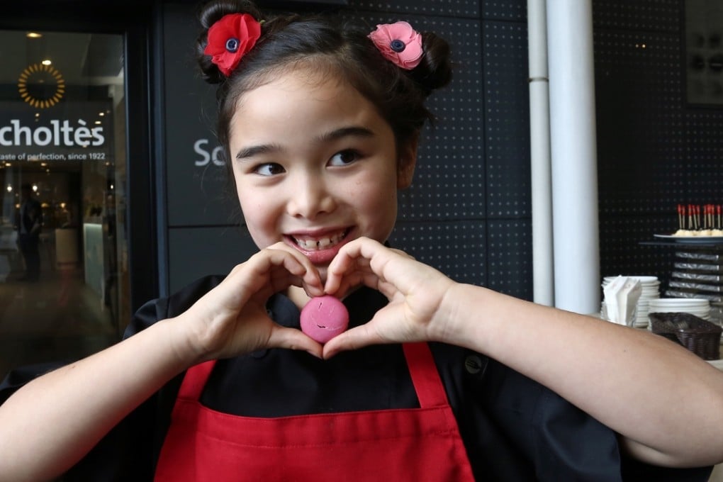 Child chef Estie Kung, eight, who was in Hong Kong this week to promote the TV show on which she is a contestant, Man VS Child: Chef Showdown. Photo: Jonathan Wong