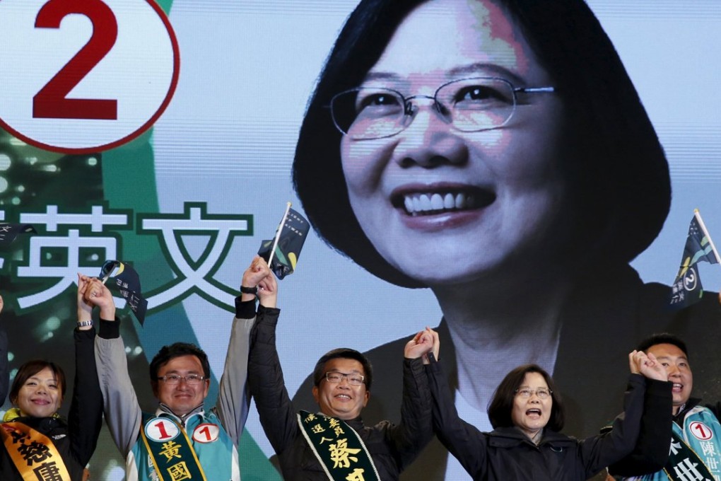 DPP presidential candidate Tsai Ing-wen shouts slogans during a campaign rally in Taichung. A Tsai victory would mean greater emphasis on promoting the economic prospects of the less-affluent members of society. Photo: Reuters