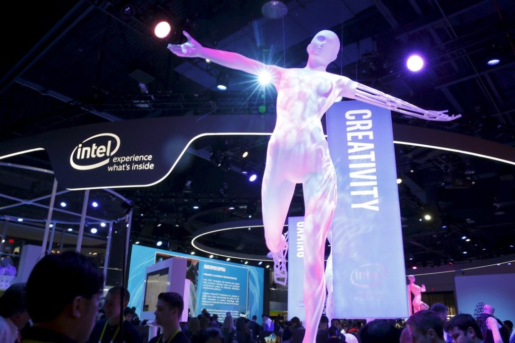 Attendees look over products with Intel processors at the Intel booth during the 2016 CES trade show in Las Vegas, Nevada on January 7. The company has said it will spend up to US$5.5 billion to retool its existing chip plant in Dalian in northeast China’s Liaoning province. Photo: Reuters
