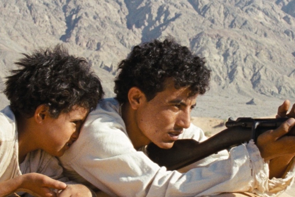 Jacir Eid Al-Hwietat and Hussein Salameh Al-Sweilhiyeen in Theeb (Wolf).
