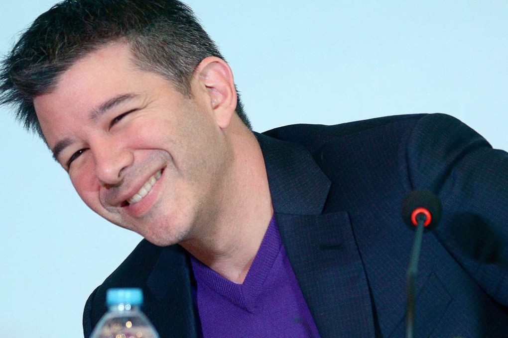 Travis Kalanick, CEO of the global ridesharing service Uber, smiles as he attends a press conference in Beijing on January 11. Uber launched in China in February 2014 and is active in 21 cities on the mainland, with plans to be in 100 cities within a year. Photo: AFP