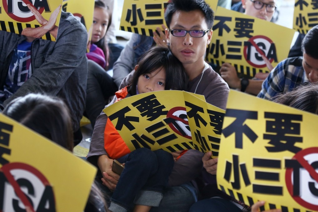 Parents protest against the Territory-wide System Assessment outside Legco They are unhappy that their children are being drilled for exams that mean nothing to them personally and are not learning much in the process. Photo: Jonathan Wong