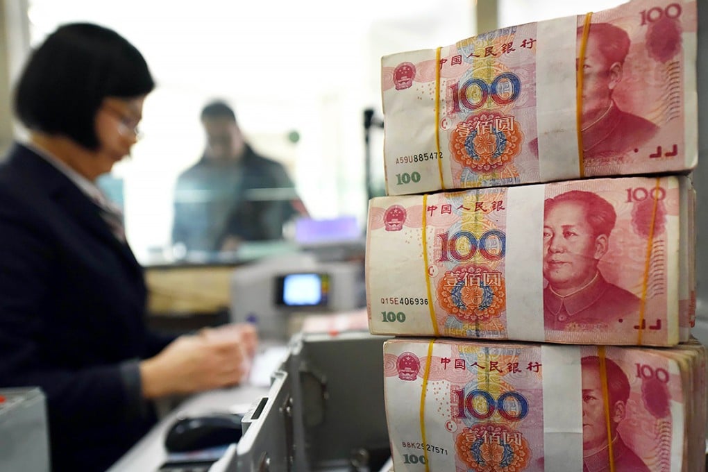 Chinese banks extended a record 11.72 trillion yuan (HK$13.83 trillion) in local currency loans last year to bolster growth. Photo: AFP