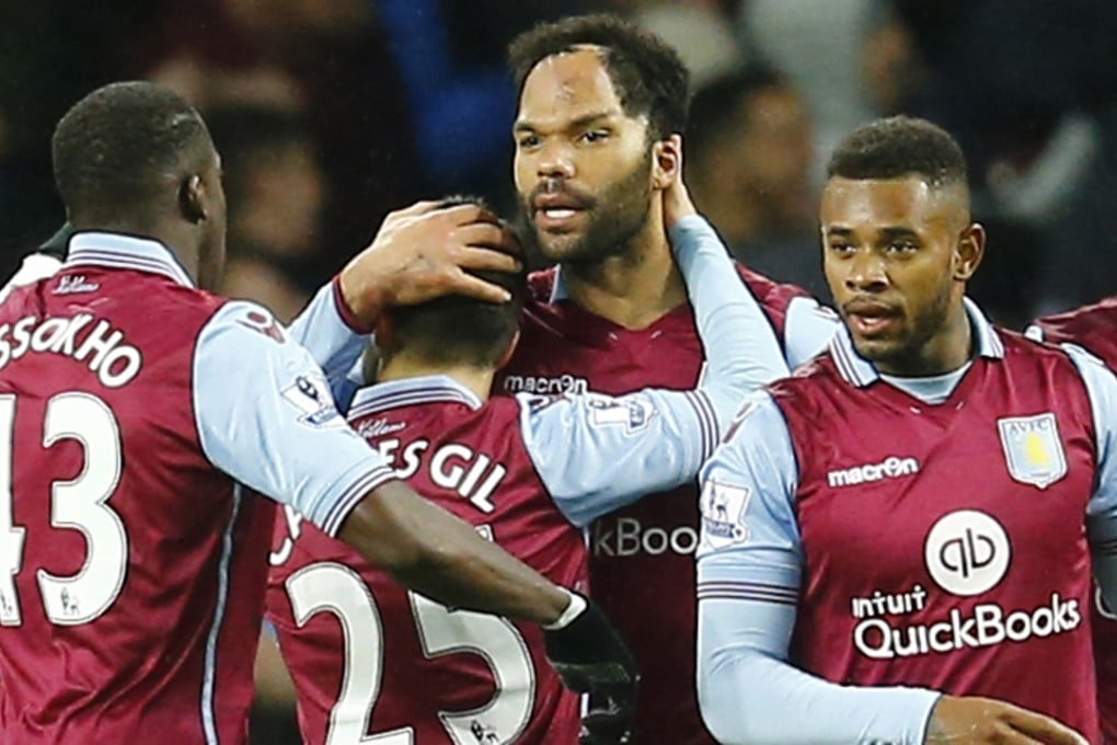 Aston Villa teammates celebrate a rare 1-0 victory over Crystal Palace. The club’s fortunes have been on a downward spiral with aloof American owner Randy lerner keen to sell. Photo: Reuters