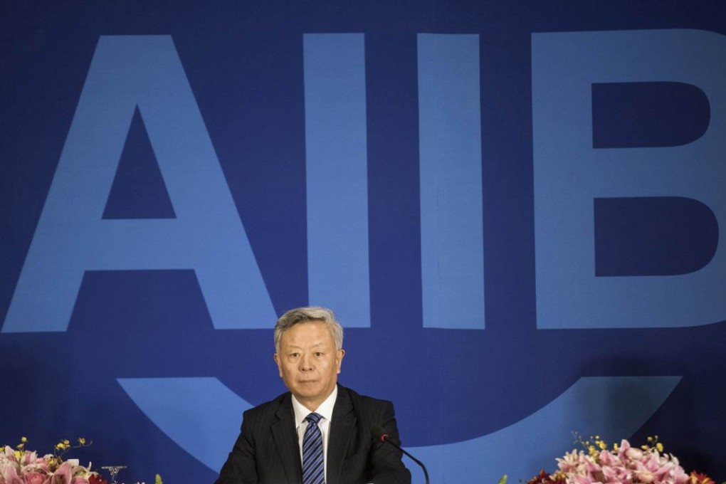 Jin Liqun, the first president of the Asian Infrastructure Investment Bank, attends a press conference in Beijing on Sunday. Photo: AFP