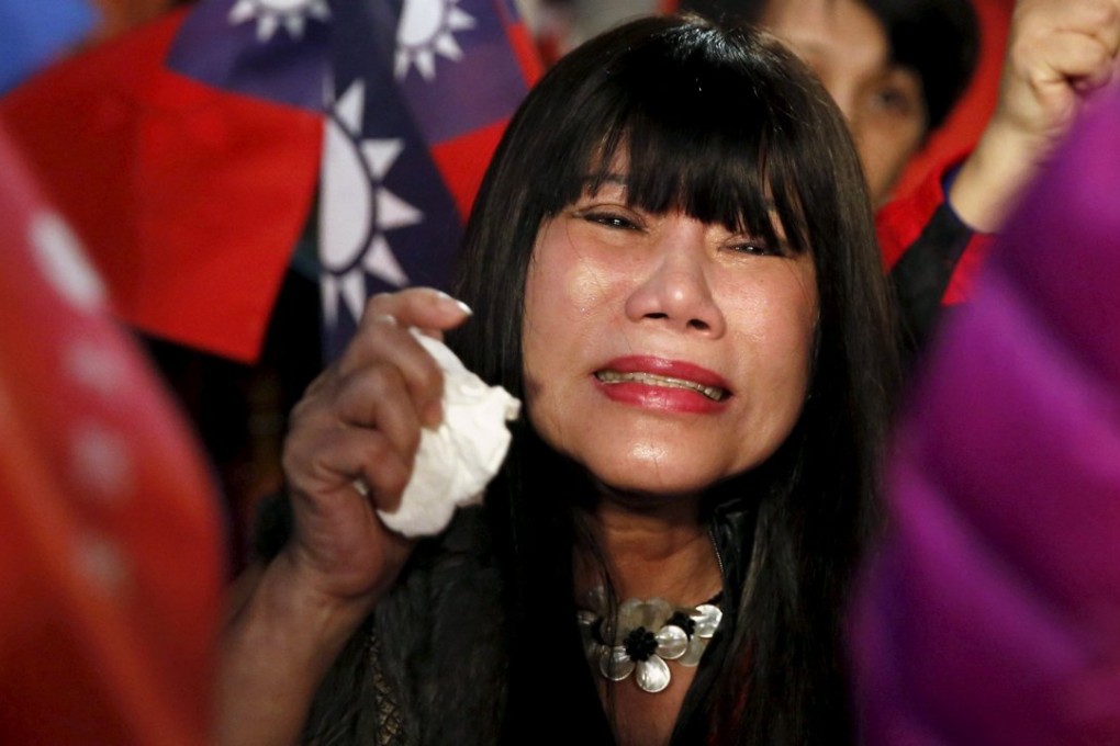 Raw emotion was on display among the Kuomintang Party supporters as they lost the Taiwan election. Photo: Reuters