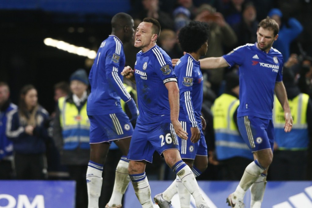 John Terry celebrates scoring the third goal for Chelsea on his 700th appearance for the club. Photo: Reuters