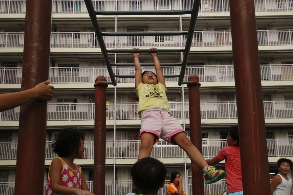 Children in public housing probably get a better deal: they are at least provided with playing areas and facilities that make interacting with others easy. Photo: AP