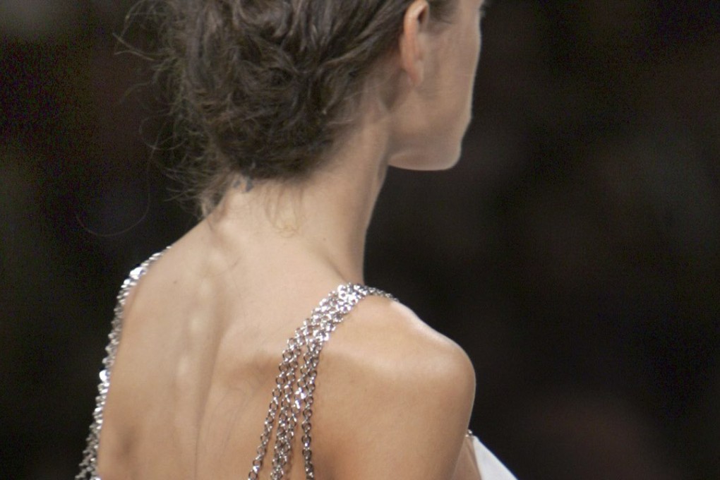 A model on a Paris catwalk. France's lower house of parliament has adopted a bill that would require models to present a doctor’s certificate that they are not excessively thin. Photo: AP