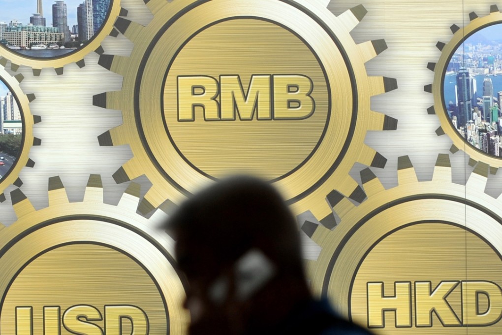 DBS says that the Hong Kong dollar has become a proxy for the weak yuan. Photo: AFP