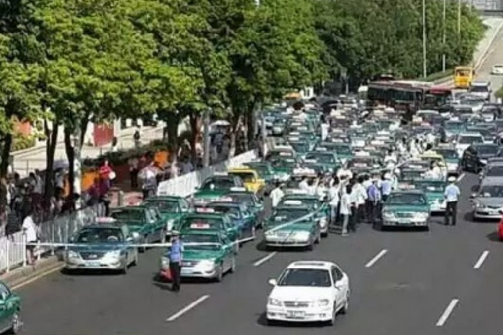 Photos uploaded on Chinese microblogging site Weibo show a ‘go-slow’ campaign in Guangzhou last July as cabbies protested how car-hailing apps were encroaching on their business. Photo: SCMP Pictures