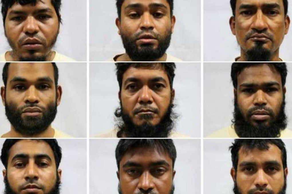 From left to right: Alam Khurshed, 27; Alam Mahabub, 34; Ali Abdul, 40. Ali Md Ashraf, 33; Alim Abdul, 32; Aminur, 31. Golam Jilani Abdur Rouf, 27; Haque Md Mofazzal, 29; Hasan Md Mahmudul, 30. Photo: Singapore’s Ministry of Home Affairs