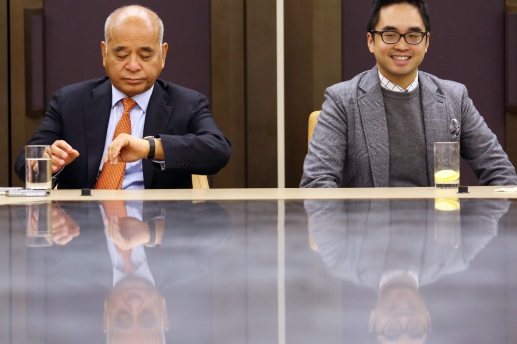 New World Development chairman Henry Cheng meets the press with his son, executive vice-chairman Adrian Cheng. Photo: Nora Tam