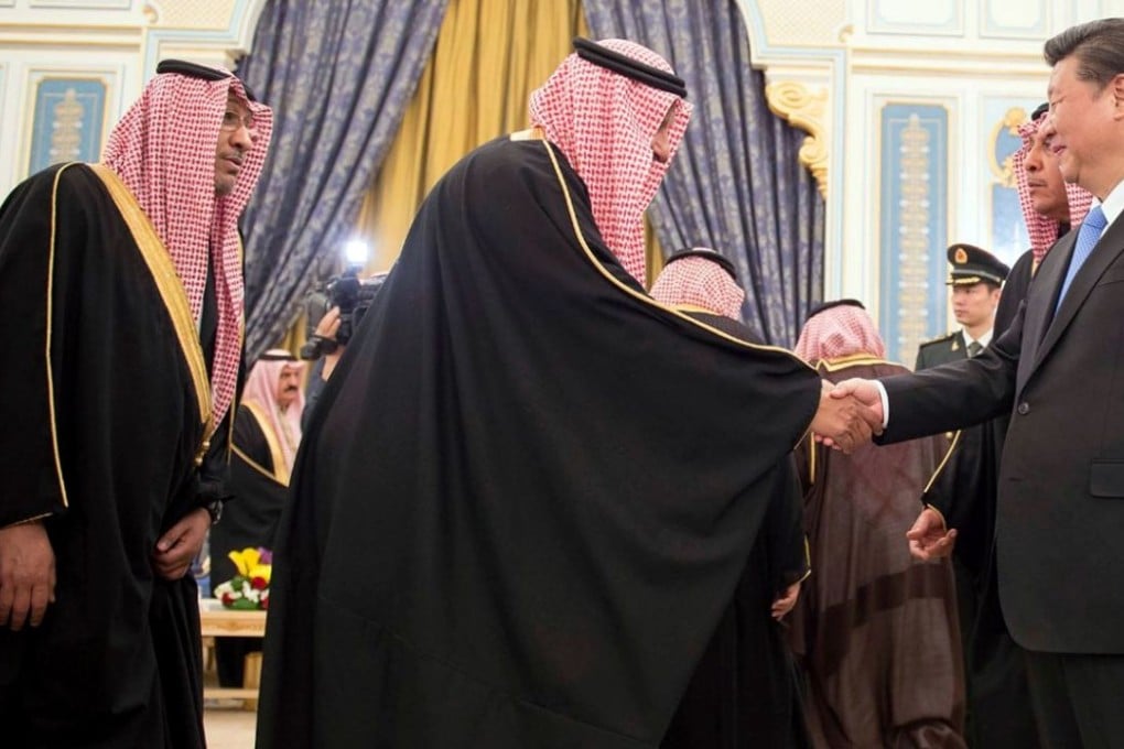 Chinese President Xi Jinping (right) is greeted by members of the Saudi Shura Council following his arrival in Riyadh on Tuesday. Photo: AFP