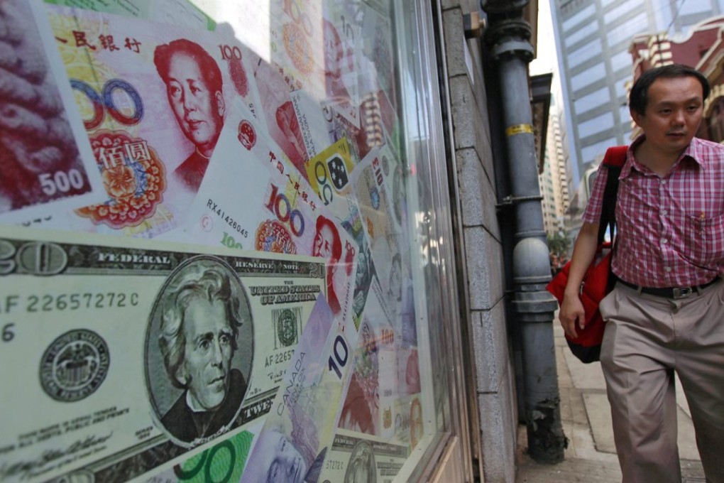The spread between onshore and offshore yuan has narrowed to 275 basis points. Photo: EPA