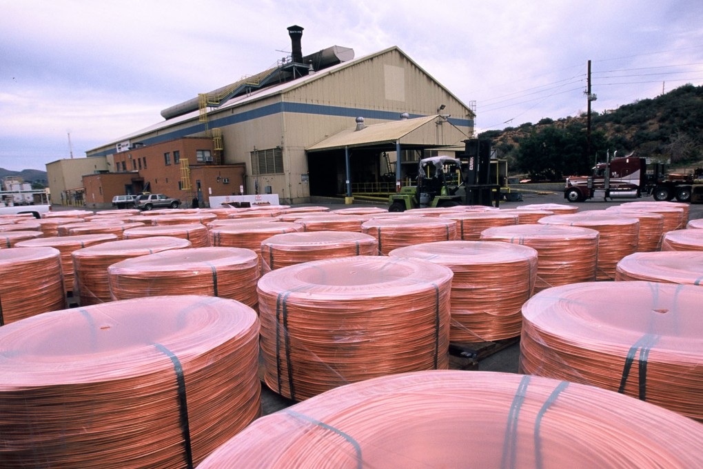 This handout photo received 26 June 2006, courtesy of Phelps Dodge Corporation shows copper rods in Miami, Arizona. US mining company Phelps Dodge said 26 June 2006, it will buy Canadian companies Inco and Falconbridge for about USD 40 billion, forging the world's largest nickel company and a leading copper miner.The cash-and-stock deal comes amid soaring commodities prices that are spurring consolidation in the mining sector as companies seek to broaden their resources base. In the steel sector, Mittal, the world leader, and its closest rival Arcelor announced 25 June a merger valued at 27 billion euros (34 billion dollars). Phelps Dodge Inc., Inco Limited and Falconbridge Limited agreed to combine "to create a North American-based mining company that is one of the world's largest."The new company, Phelps Dodge Inco Corporation, and its copper division will be based in Phoenix, Arizona, Phelps Dodge's headquarters. Inco Nickel, the new company's nickel division, will be headquartered