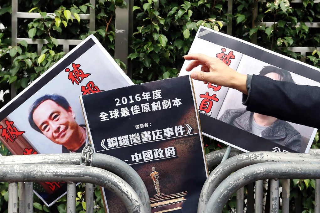 Civic Party members protest outside Beijing’s liaison office calling for the release of the missing booksellers, including Lee Bo. Photo: K. Y. Cheng