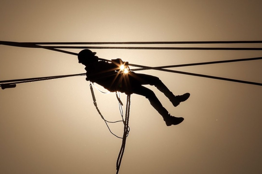 State Grid Corporation is pushing for regional and intercontinental interconnection of power grids in the next few decades. Photo: EPA