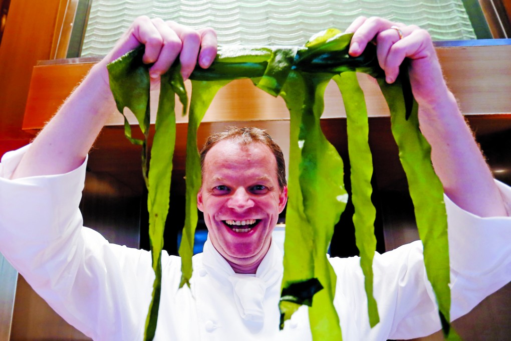 Culinary director at Amber Richard Ekkebus with seaweed, the “vegetables of the sea”. Photo: Jonathan Wong