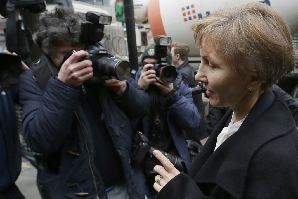 Marina Litvinenko, widow of Alexander Litvinenko, makes a statement outside the High Court in central London on Thursday. Photo: AP