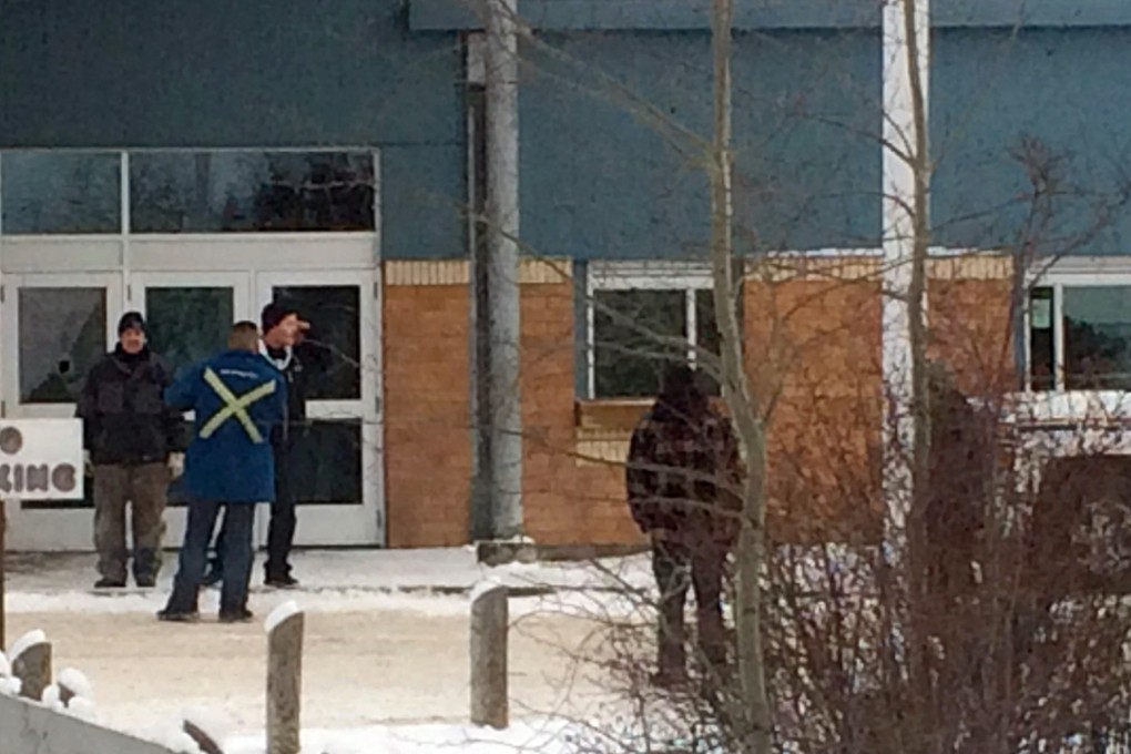 The outside of La Loche Community School on Friday January 22, 2016. Prime Minister Justin Trudeau said the shootings occurred at a high school and another location but did not say where else. School shootings are rare in Canada. Photo: AP