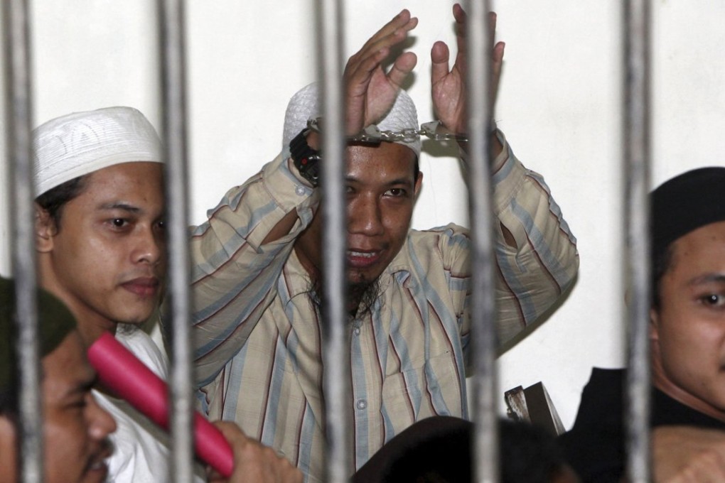 Radical Muslim cleric Aman Abdurrahman (centre). Photo: Reuters