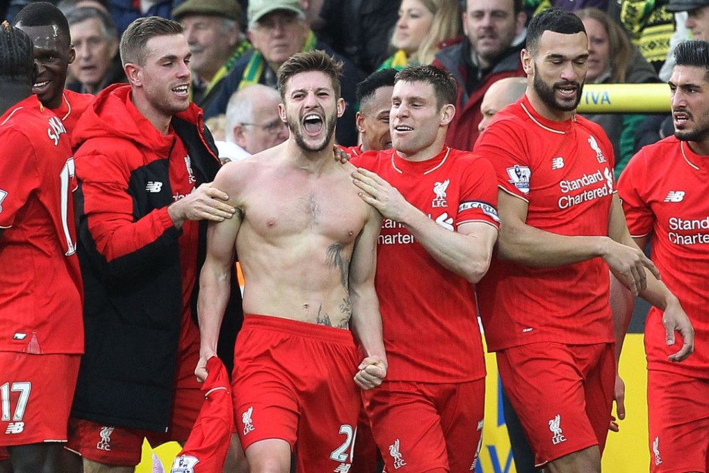 A shirtless Adam Lallana celebrates the winner in stoppage time to clinch a 5-4 victory over Norwich City at Carrow Road. Photo: AFP