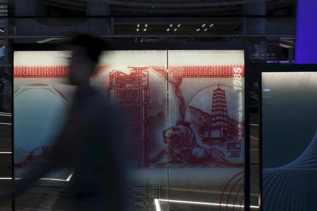An enlargement of a 1985 Hong Kong 100 dollar banknote is displayed during an exhibition at HSBC headquarters in Hong Kong on January 20, 2016. The Hong Kong dollar fell to more than eight-year low on Wednesday as China's sluggish economy and weak yuan currency dampened the market sentiment. Photo: Reuters
