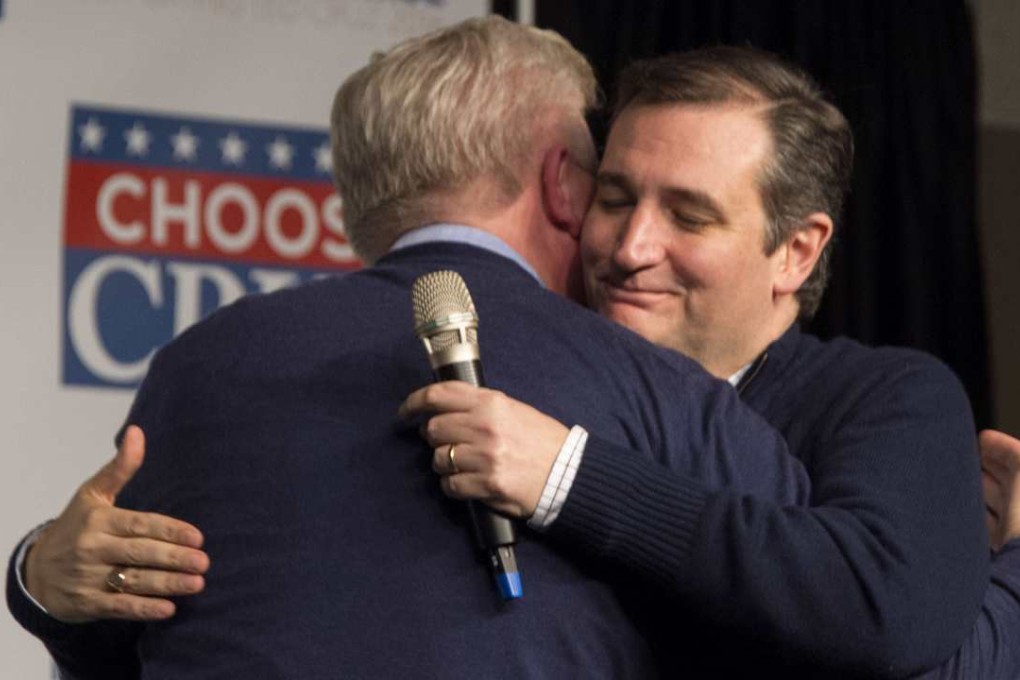 Glenn Beck (left) gets a hug after announcing his endorsement of US Senator and Republican Presidential Candidate Ted Cruz (right) during a campaign event in Waterloo, Iowa,on Saturday. Photo: Agence France-Presse