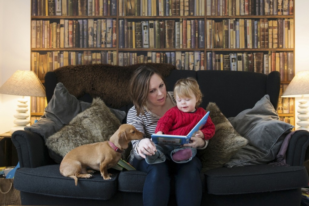 A mother reading to her son. Being read to is something that helps children even if they already know how to read. Photo: Corbis
