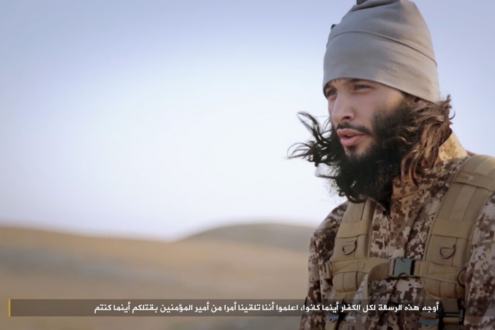 An image grab taken from a video released by the jihadist media arm Al-Hayat Media Centre on January 24, 2016, purportedly shows Chakib Akrouh, also known by his nom de guerre Abu Fu’ad al-Faransi, speaking to the camera at an undisclosed location. The Islamic State (IS) group released the video purporting to show nine jihadists involved in the November Paris attacks that killed 130 people, in which they threaten "coalition" countries including Britain. Photo: AFP