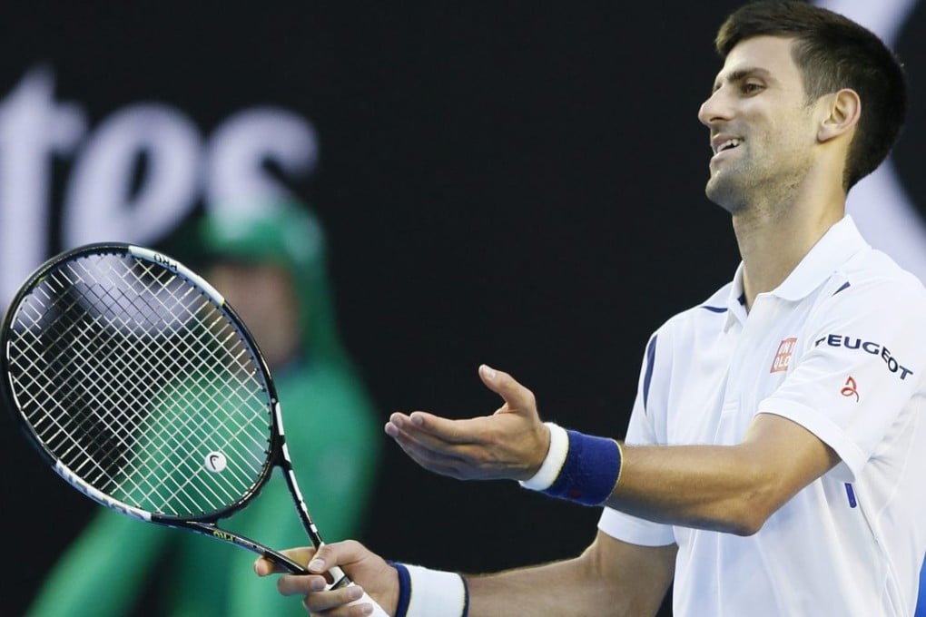A frustrated Novak Djokovic during his error-riddled five-set win over Giles Simon of France at the Australian Open on Sunday. Photo: EPA