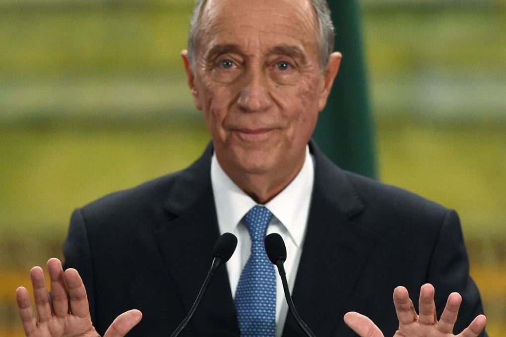 Marcelo Rebelo de Sousa gestures as he delivers a speech after winning the Portuguese presidential election in Lisbon on Sunday. Photo: AFP