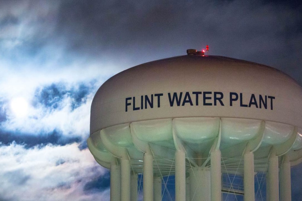 The City of Flint Water Plant is illuminated by moonlight on January 23. Photo: AFP