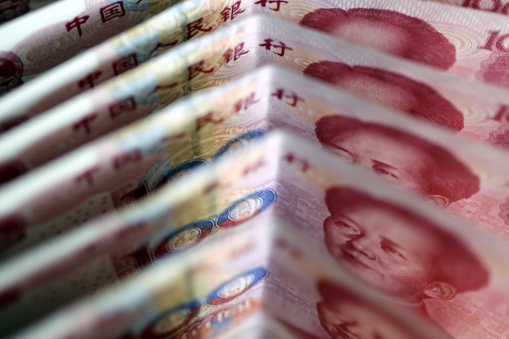 The spread between onshore and offshore yuan has now narrowed to 293 basis points, down from the record 1,400 basis points on January 7. Photo: Reuters