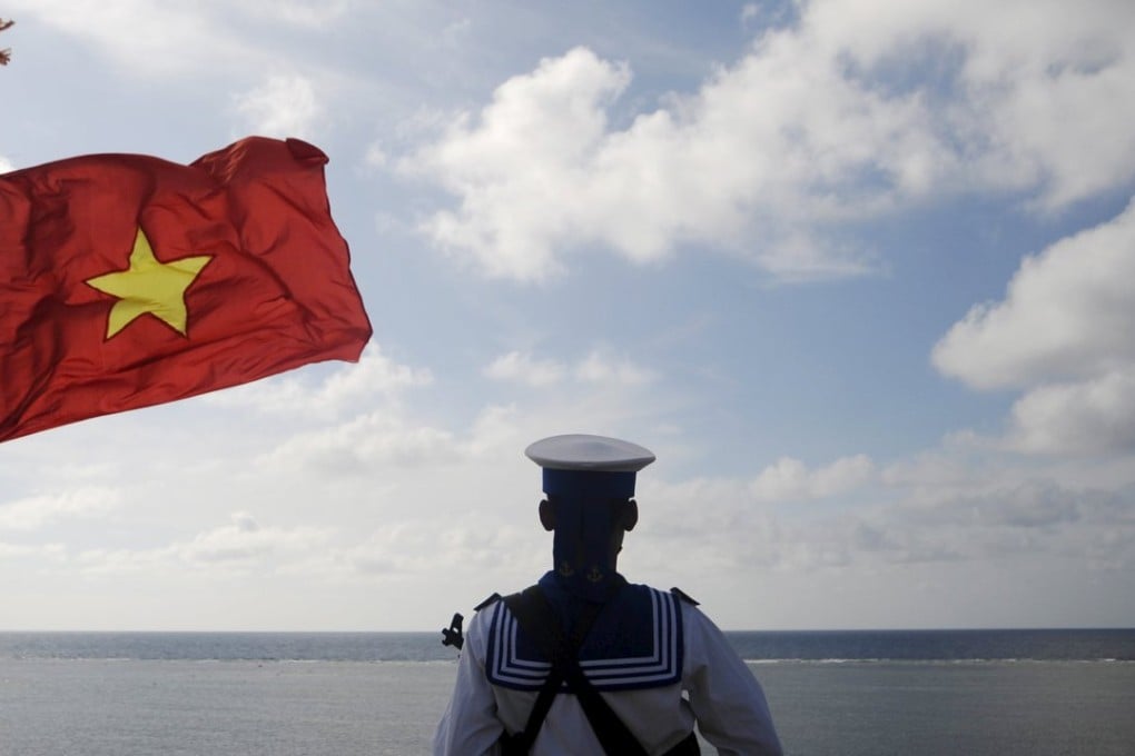 A Vietnamese naval soldier stands guard at Thuyen Chai island in the Spratly archipelago. Photo: Reuters