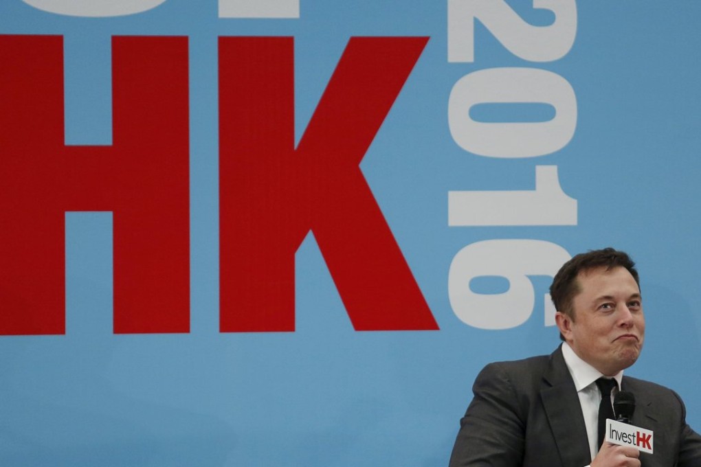 Tesla Chief Executive Elon Musk reacts as he attends a forum on startups in Hong Kong, China. Photo: Reuters