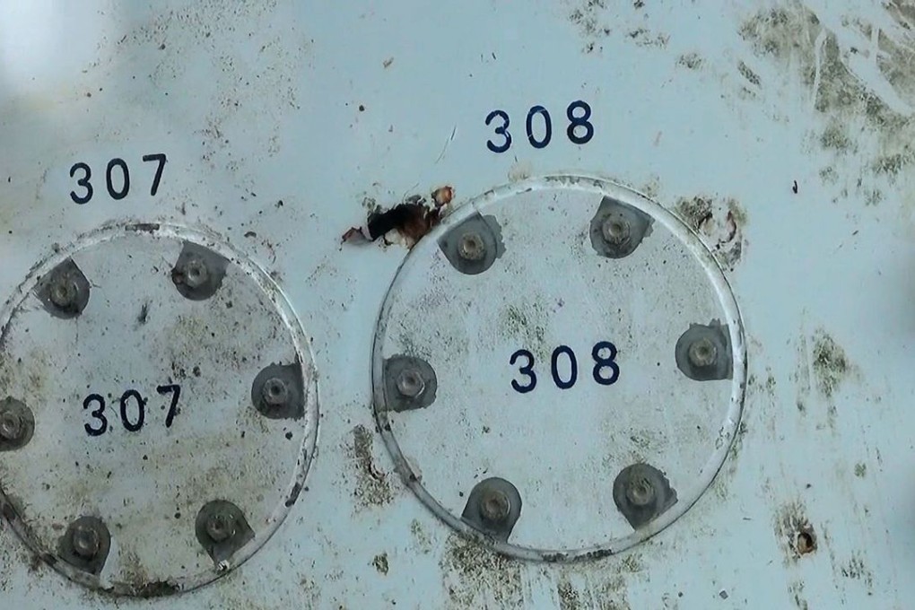 A piece of suspected aircraft debris found by fishermen in the southern Thai province of Nakhon Si Thammarat. Photo: AFP