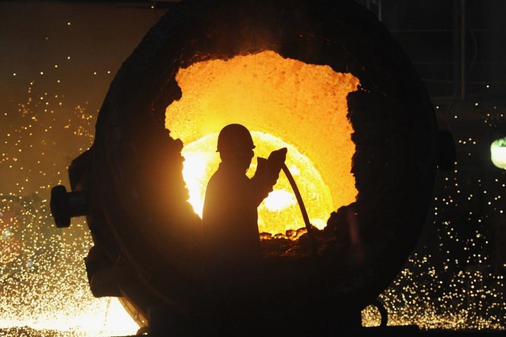 A worker operates a furnace at a steel plant in Hefei, Anhui province. Photo: Reuters