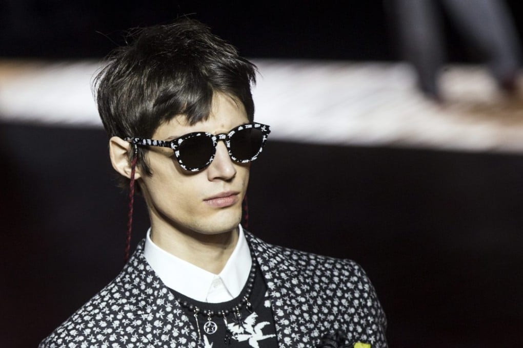 A model presents a creation from the autumn/winter 2016/17 men's collection by Belgian designer Kris Van Assche for Dior Homme during Paris Fashion Week. Photo: EPA